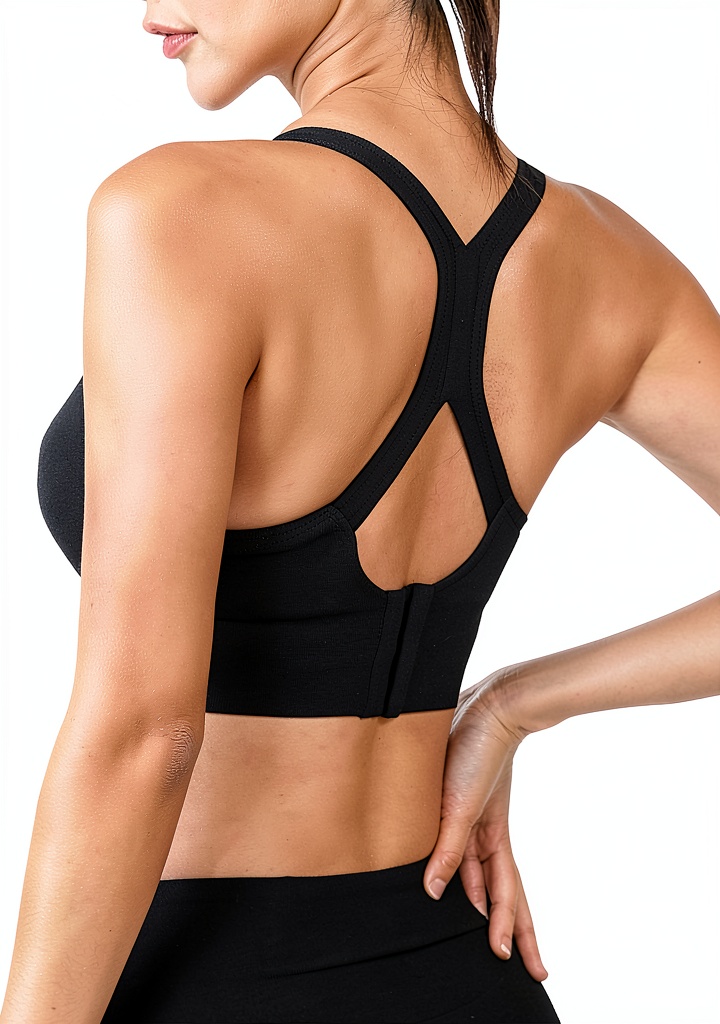 Installing Soutien-gorge de sport Yimutian léger extensible pour femme on a wooden desk